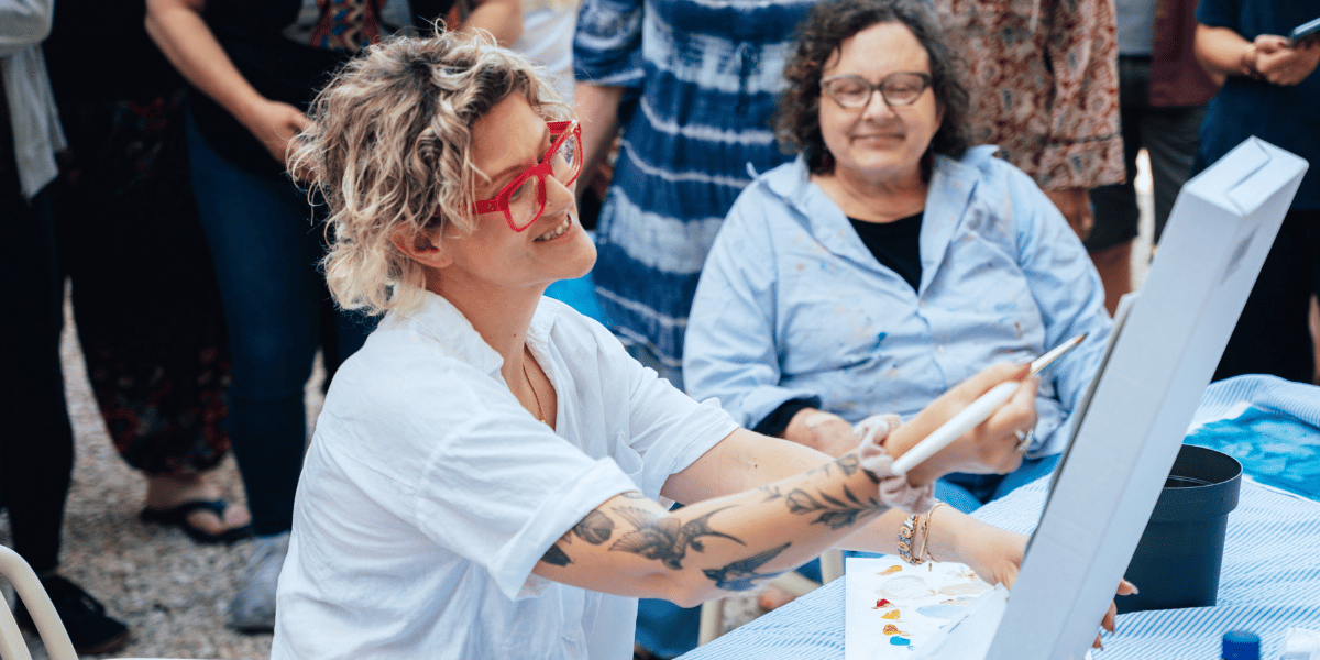 Alannah Anderson doing a Painting Demonstration