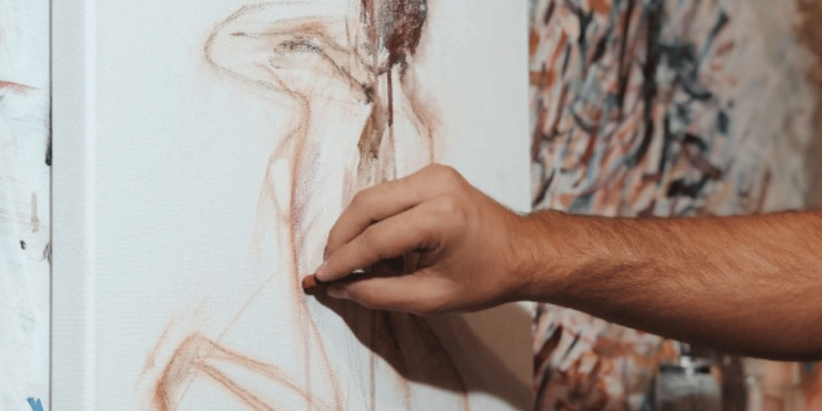 John Milan drawing with pastels